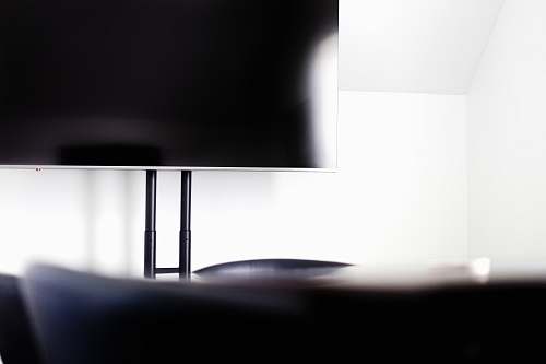 conference room silver flat screen TV showing black screen room